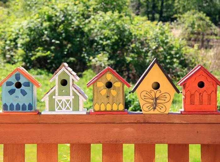 Birdhouses On Fence Posts-3